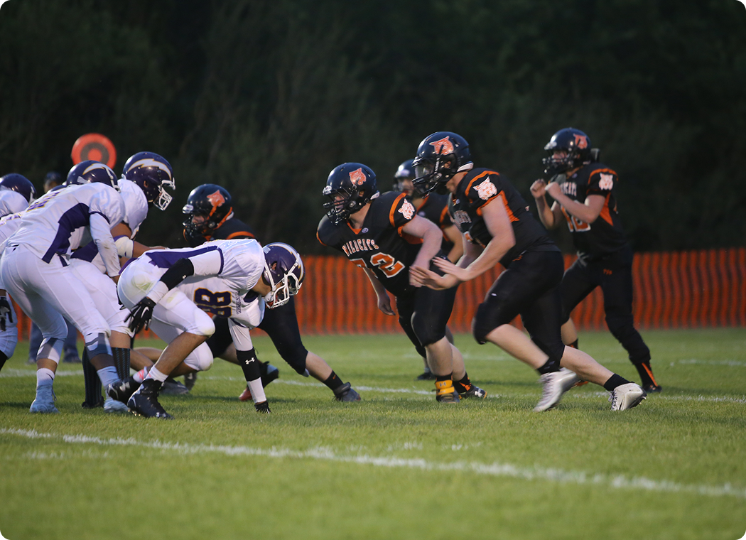 High school football game in action