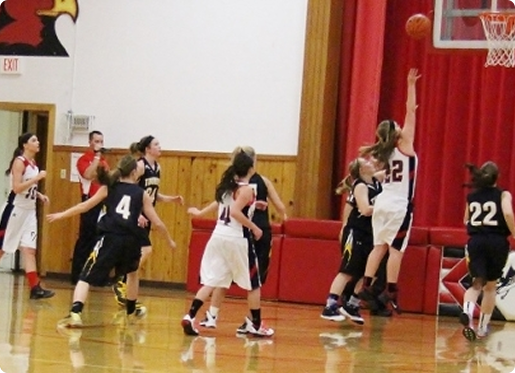 Girls' basketball game action shot